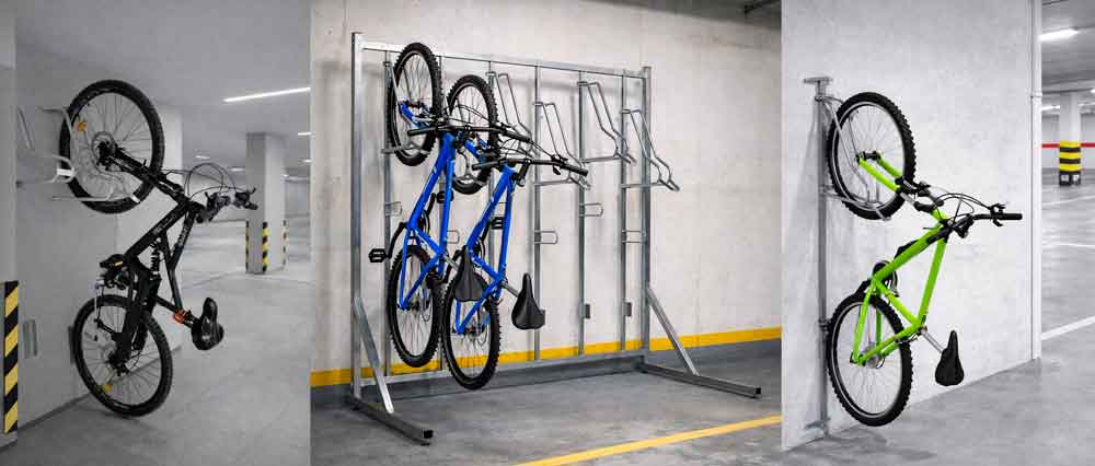 Soportes verticales para bicicletas instalados en garaje comunitario